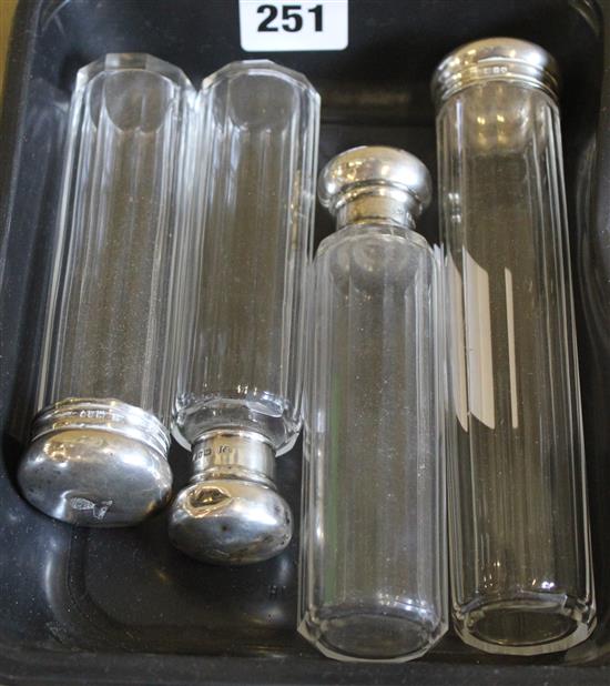 4 silver top glass bottles